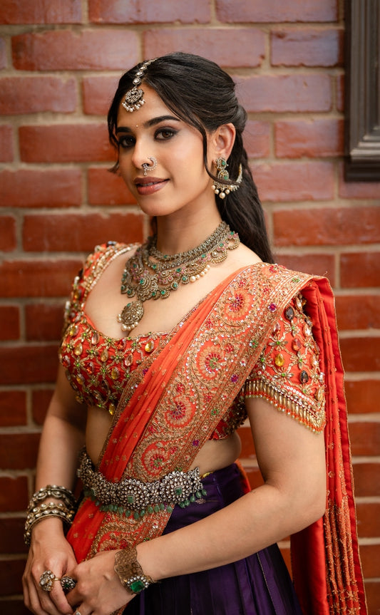 Kanjeevaram half saree in orange & purple | Bridal / Engagement wear by Studio 149, Chennai