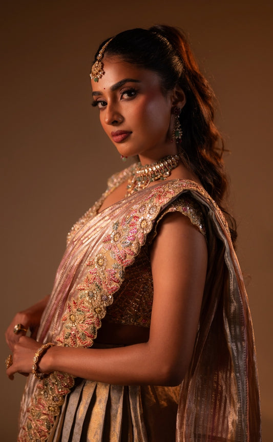 Contemporary half saree in gold | Bridal / Engagement wear by Studio 149, Chennai