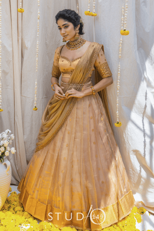 BRIDAL HALF SAREE SET IN GOLD