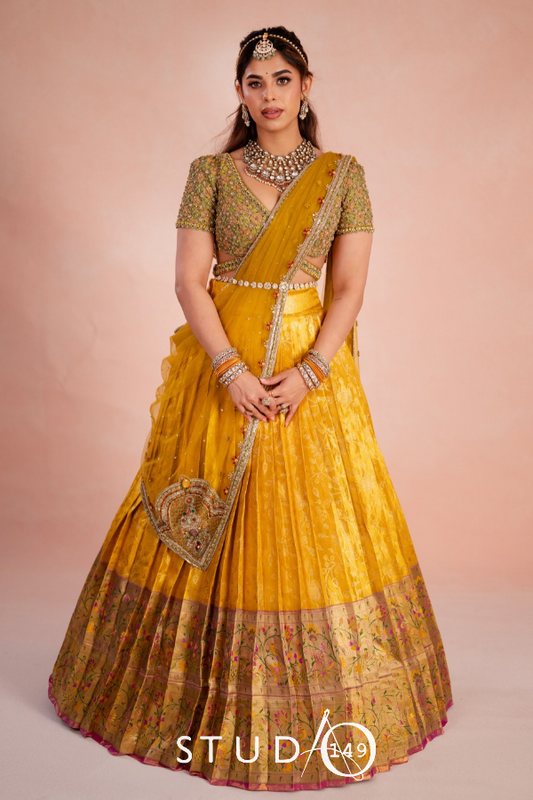 Kanjeevaram half saree in yellow and green | Bridal / Engagement wear by Studio 149, Chennai