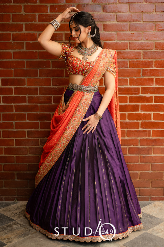 Kanjeevaram half saree in orange & purple | Bridal / Engagement wear by Studio 149, Chennai
