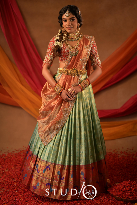 Kanjeevaram half saree in rust & green | Bridal / Engagement wear by Studio 149, Chennai