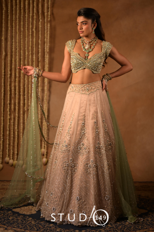 Hand embroidered tulle lehenga in rose gold & mint green | Reception wear by Studio149, Chennai