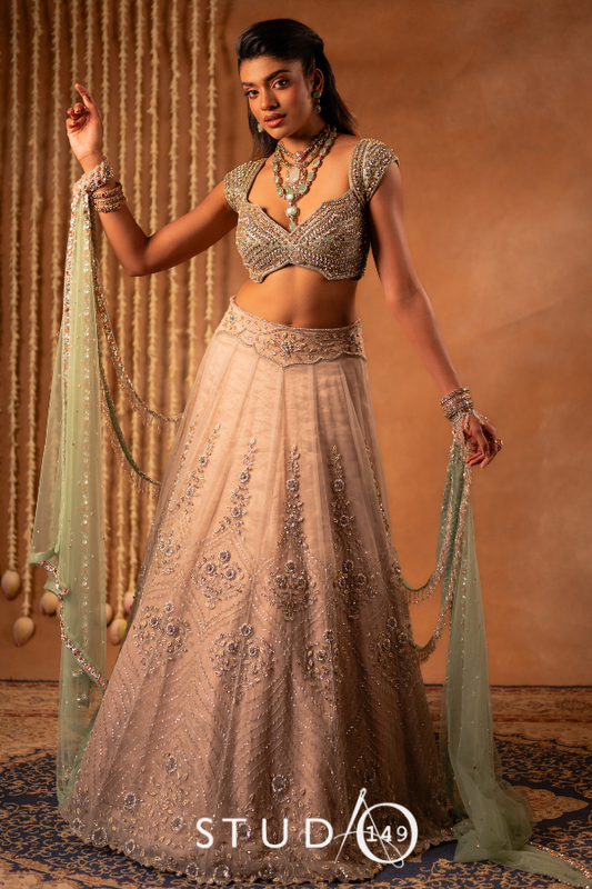 Hand embroidered tulle lehenga in rose gold & mint green | Reception wear by Studio149, Chennai