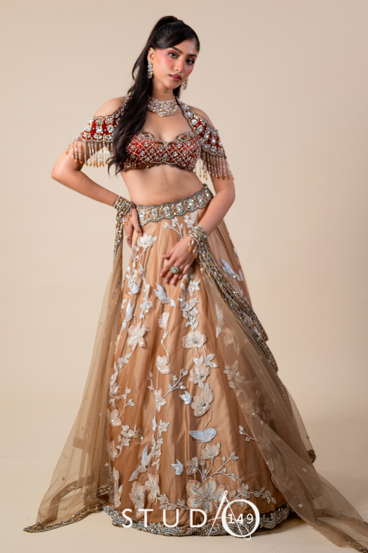 Hand embroidered tulle lehenga in gold & rust | Reception wear by Studio149, Chennai