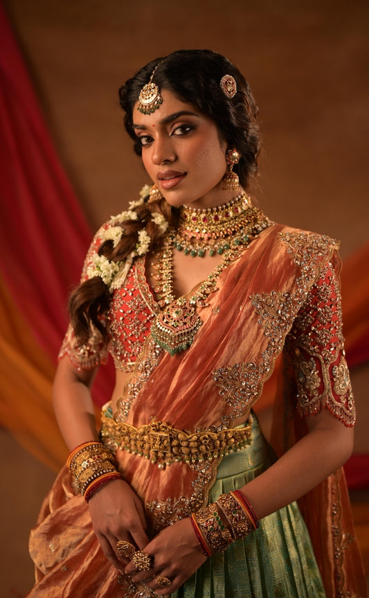 Kanjeevaram half saree in rust & green | Bridal / Engagement wear by Studio 149, Chennai