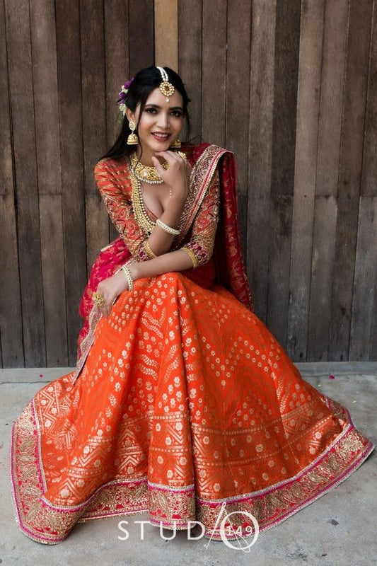 BRIDAL BANARAS LEHENGA IN TANGERINE