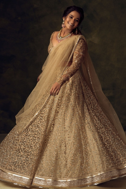 BRIDAL RECEPTION LEHENGA IN GOLD
