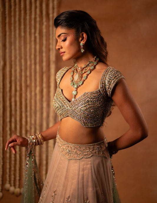 Hand embroidered tulle lehenga in rose gold & mint green | Reception wear by Studio149, Chennai