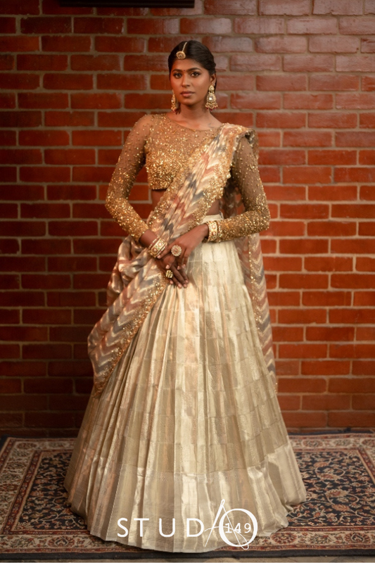 BRIDAL KANJEEVARAM HALF SAREE IN GOLD AND SILVER