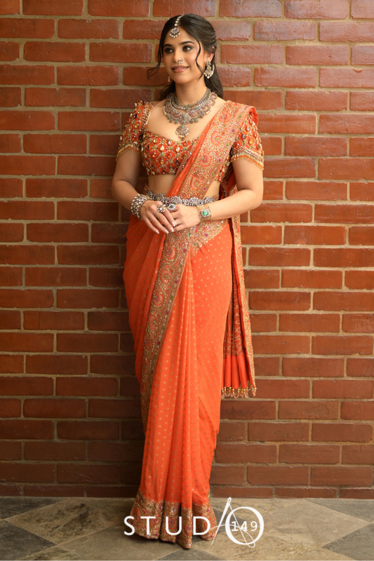 Banarasi georgette saree in orange | Reception / Bridal wear by Studio149, Chennai