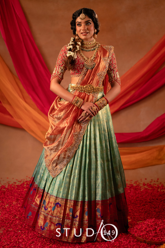 Kanjeevaram half saree in rust & green | Bridal / Engagement wear by Studio 149, Chennai