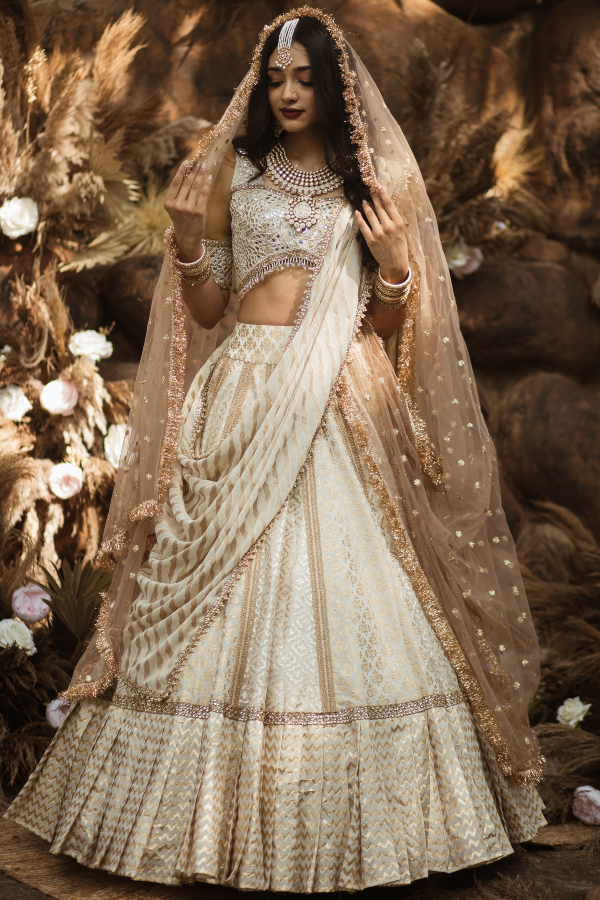 Off white and gold Lehnga | Sabyasachi lehenga, Indian fashion, Fashion